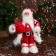 Santa Claus "with boxes gift and flashlight" 31 cm, red