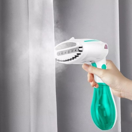 KitFort KT-9192-2, manual, 1300 W, 120 ml, 20 g/min, white and green-2