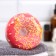 The bath bomb "Donut with coconut sprinkling", red
