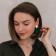 Earrings Metal "lady" waves, green color in gold