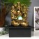 Three Elders with children and gold, 35x25x20 cm desktop fountain from the network