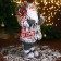 Santa Claus "In a white-red fur coat with a strap, with skis" 45 cm