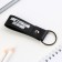Kezzle keychain to the leatherette "Real Man", 11 x 2.5 cm