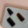 Vocal bottle for perfume, with a spray, 5 ml, brown/black color