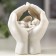 Souvenir Polystone "Angel Sleeping in the palms" 6.7x5.5x4.3 cm