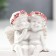 Polystone souvenir "Snow -white angels in pink wreaths, they have mercy" 6x5.5x4 cm