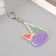 Acryl keychain "Snakes in the New Year's cap, with a Christmas tree" 6x5.4 cm