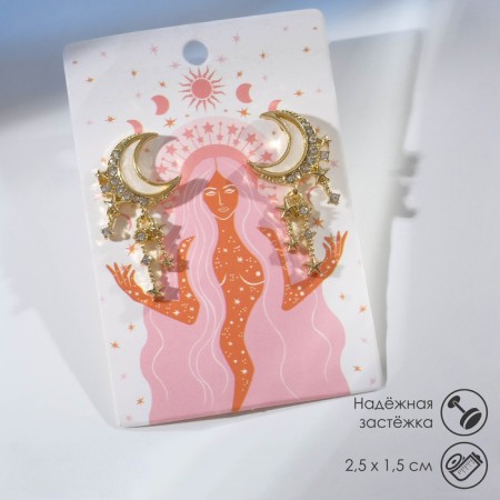 Earrings with “crescent” rhinestones, the color is white in gold