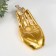 Standing interior polystone "Bird in the palm" gold 19.5x9.3x9.5 cm