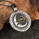 Amulet "Sun and Moon" with a stone topaz, 35x42 mm, metal
