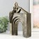 Polystone souvenir "Two on the arch" under metal 19.2x8.7x30.4 cm