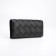 Women's wallet on magnets, black color