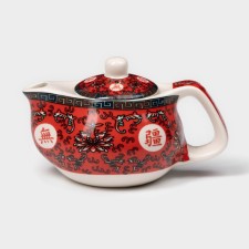 Keramic teapot with a metal sieve 