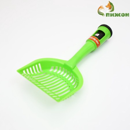 A scoop for cleaning a cat with a container for bags of 26 x 6 x 5 cm, green