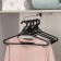 Set of hangers for clothing, size 46-48, 5 pcs, black color
