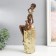 Souvenir Polystone "African with a jug, on the stand" Gold Pattern - circles 10.5x8x33.5 cm