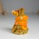Polystone souvenir "Orange snakes with flowers on coins" 6x5.8x8.8 cm