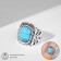 Ring "turquoise world" oval, black and blue color in black silver, dimensionless