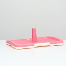 A toilet for dogs with a grid and a column of 47 x 34 x 5.5 cm, pink