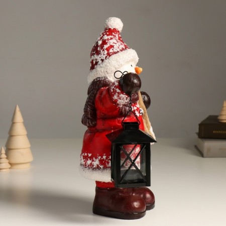 Ceramics Snowman "Snowman in a red fur coat, with a lantern and skiing" 21.5x12x31 cm-1
