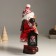 Ceramics Snowman "Snowman in a red fur coat, with a lantern and skiing" 21.5x12x31 cm