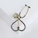 Brooch "Stetoscope" heart, black color in gold
