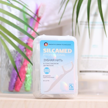 Silcamed Dental Proff System toothbrush in a plastic holder