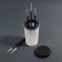 A capacity for cleaning and storing brushes, with holders and a lid, 200 ml, the color is transparent/black