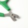 Coger scissors with an emphasis for a finger, a hole of 6 mm, green with white