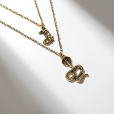 The pendant of the cobra, the color of the black gold, l = 60 cm