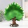 Polystone souvenir "Blue peacock with green blossomed tail in the meadow" 10.5x22x26 cm