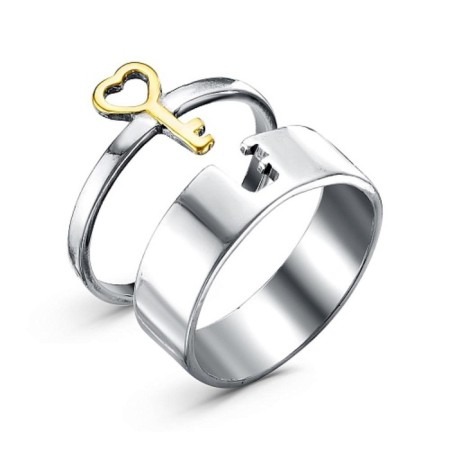Ring "Key" from the heart, echoing with oxidation, selective gilding, 17 size