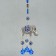 Suspension from the evil eye Metal "Elephant in Popon with bells" 21 cm
