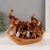 Polystone souvenir "Five elephants with a blanket on a stand" under a tree 6x22x15.5 cm