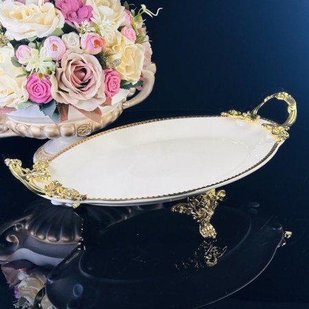 Dish with lenardi handles, on legs, porcelain, length 30.5 cm