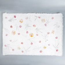 Handmade paper with flowers and herbs 