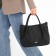 The bag is female, medium size, long belt, black color