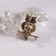 Brooch "Owl" wise, colored in black gold