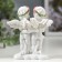 Polystone souvenir "Angels in pink wreaths with heart from roses" 10x8.5x5.5 cm