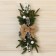 The coniferous composition "Cozy fairy tale" 50 cm, beige bow