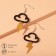 Earrings plastic "cloud" lightning, black-gold color