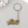 Metal key "motorcycle" wheels spin 1.9x4 cm