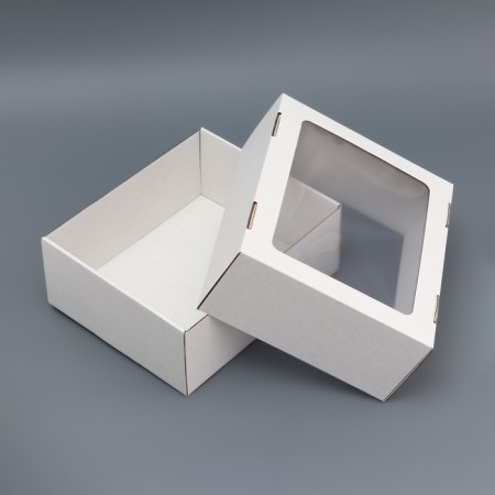 Box the team, cover is "white" with a window 25x21x10 cm-2