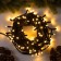Garland “thread” 10 m, IP65, UMS, dark rubber thread, 100 LED, warm white glow, 220 V