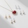 Set of 5 objects: 4 pairs fluffs, the pendant "heart", white-red color in gold, 40 cm