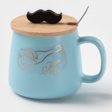 Ceramic mug with a spoon 
