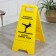The sign "Caution! Slippery floor ", 61 × 30 cm, plastic, yellow color