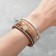 Bracelet "On the Magnet" Naichural, white-beige color in gold, 19.5 cm