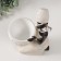 Souvenir Polystone stand "African sits, with a wicker pot" White 14x9x24 cm