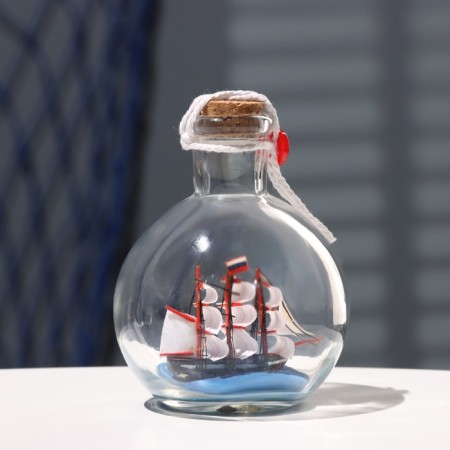 The ship souvenir "trophy", in a bottle, vertical. 9*10cm-2